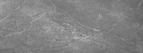 istock Grey textured concrete banner background wallpaper 1382382965