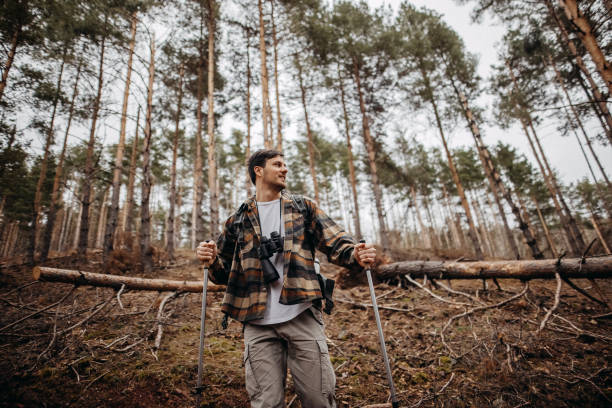istock Young man hiking on a cold winter day 1382385661