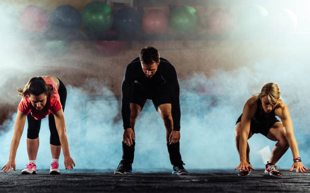 sportive people training in a gym