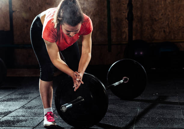 istock sportive people training in a gym 1382386761