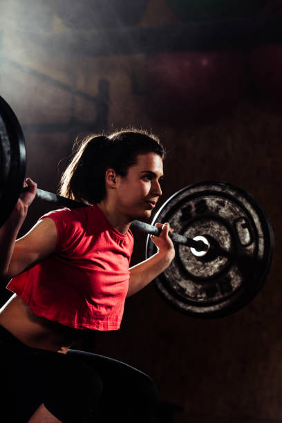 istock sportive people training in a gym 1382386763