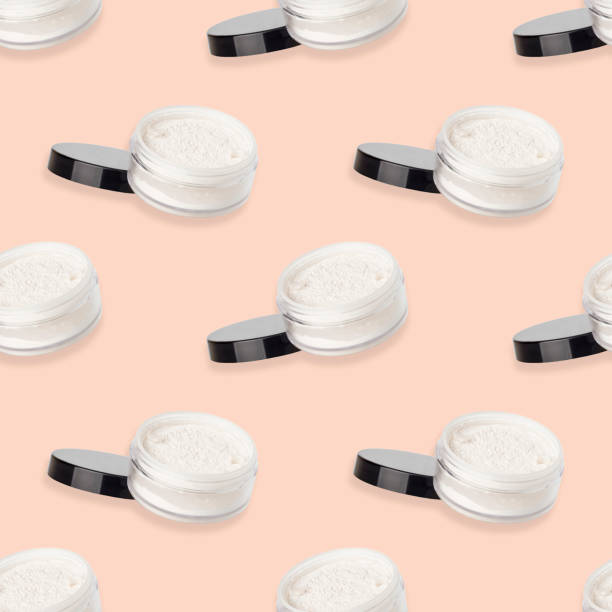 istock Seamless pattern with face powder on a gentle background. 1382386974