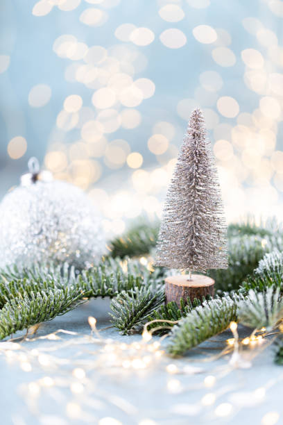 istock Christmas spruce with tree and blurred shiny lights. 1382387538