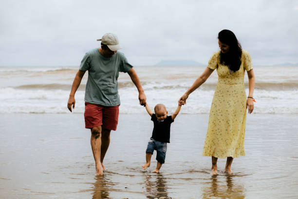 istock happy family on the beach 1382397617
