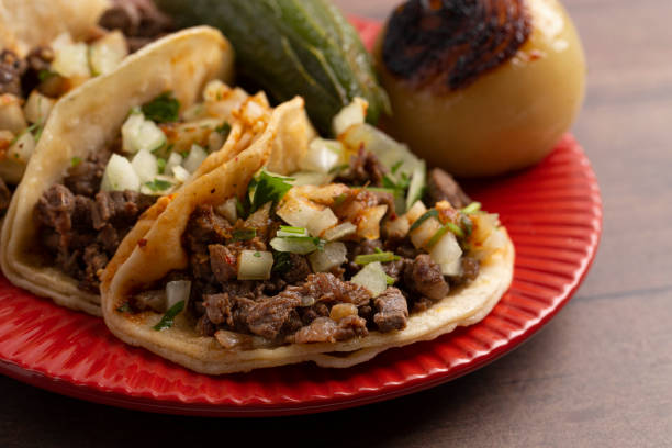 istock Three Steak Street Tacos in a Row 1382398401