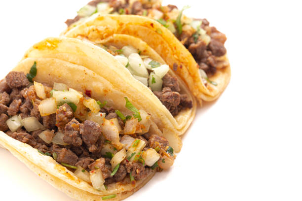 Mexican tacos with chili peppers isolated on white background