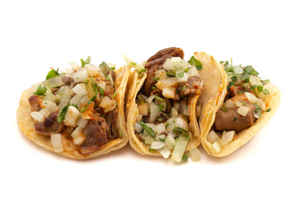 istock Three Buche Street Tacos Isolated on a White Background 1382401589