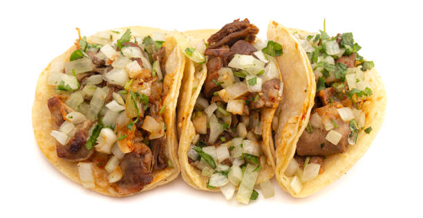 istock Three Buche Street Tacos Isolated on a White Background 1382401594