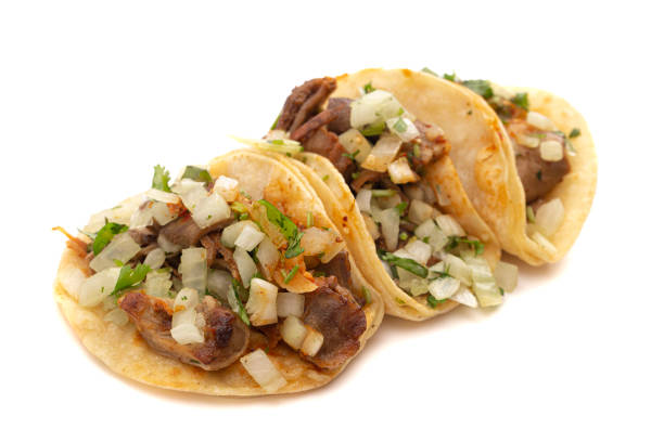 istock Three Buche Street Tacos Isolated on a White Background 1382401598