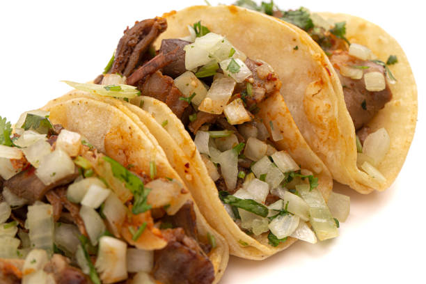 istock Three Buche Street Tacos Isolated on a White Background 1382401610