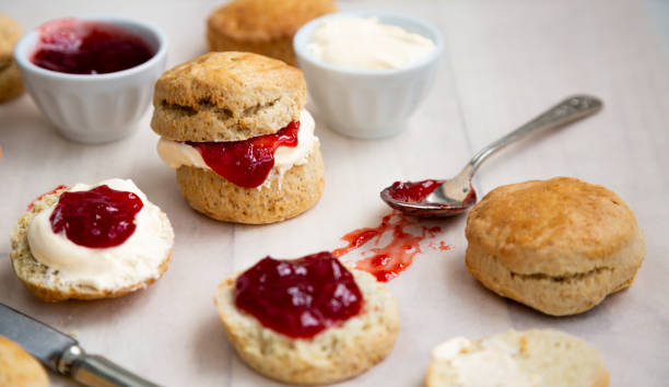 istock Delicious scones with clotted cream and strawberry jam 1382418348