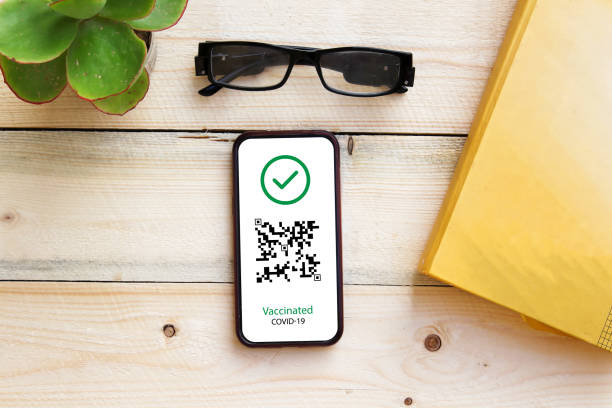 istock mobile phone with an application international covid 19 certificate 1382442894