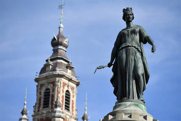 Lille, France-02 28 2022:The Column of the Goddess is the popular name given by the citizens of Lille (France) to the Memorial of the Siege of 1792. The memorial is still in the center of the Grand′ Place (central square) of Lille, France.