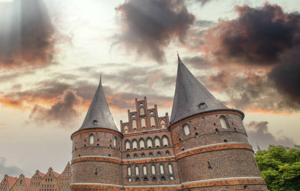 istock Holstentor gate in Lubeck at summer sunset - Germany 1382446993