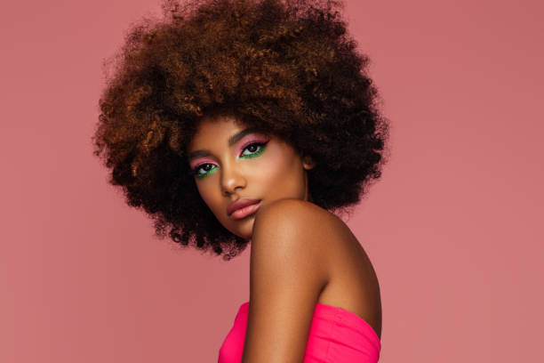 istock Beautiful afro woman with bright make-up 1382457249