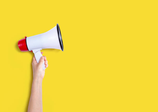 istock Person holding a megaphone 1382458432