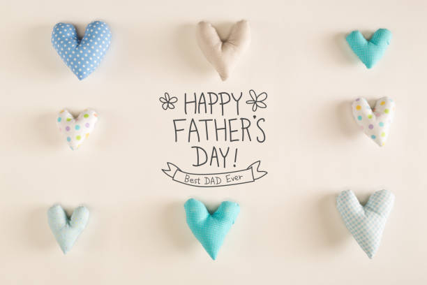 istock Father's Day message with blue heart cushions 1382458947