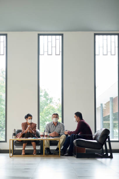 istock Business People Having Moment of Silence 1382459800