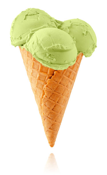 istock Green ice cream isolated on white background with clipping path. 1382460406
