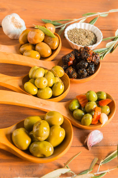 istock Still life with different varieties of olives. 1382464746