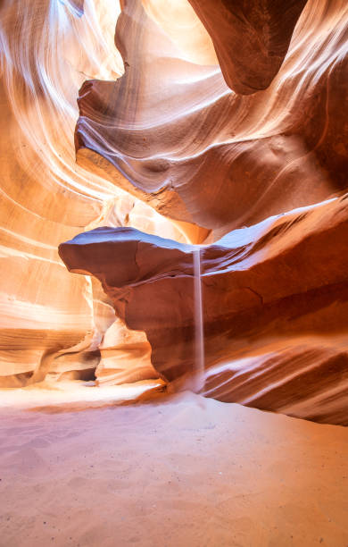 antelope canyon sunlight games and rocks - arizona - usa. - urholkad bildbanksfoton och bilder