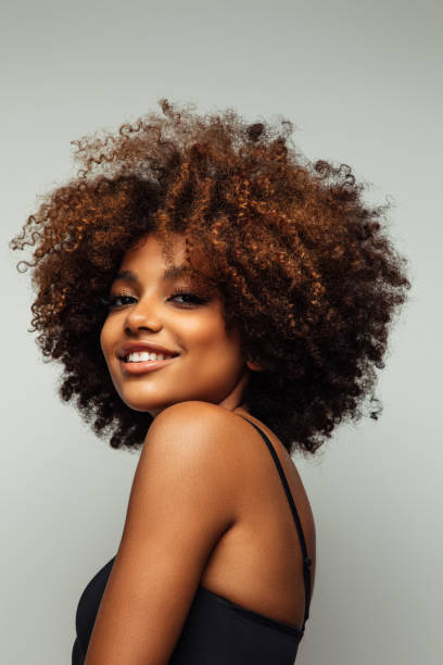 istock Beautiful afro woman with perfect make-up 1382471116