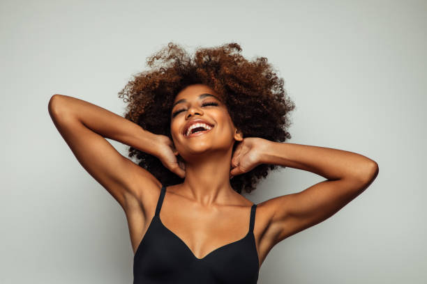 istock Beautiful afro woman with perfect make-up 1382471198