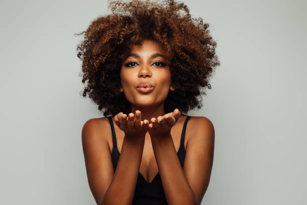 istock Beautiful afro woman with perfect make-up 1382471221