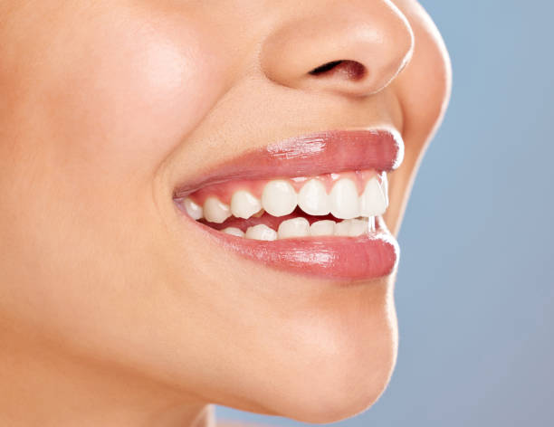 istock Studio shot of an unrecognisable woman's lips against a blue background 1382480063