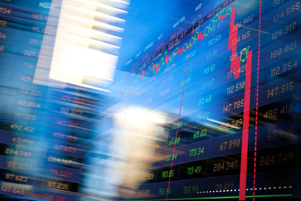 istock Finance. Graphic Arrow. Blurred office Buildings and Trading Screen Data. 1382481912