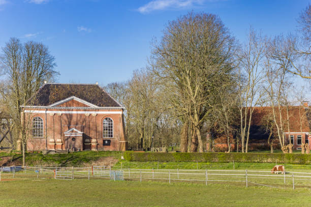 istock Historic Solwerd church in old town Appingedam 1382482468