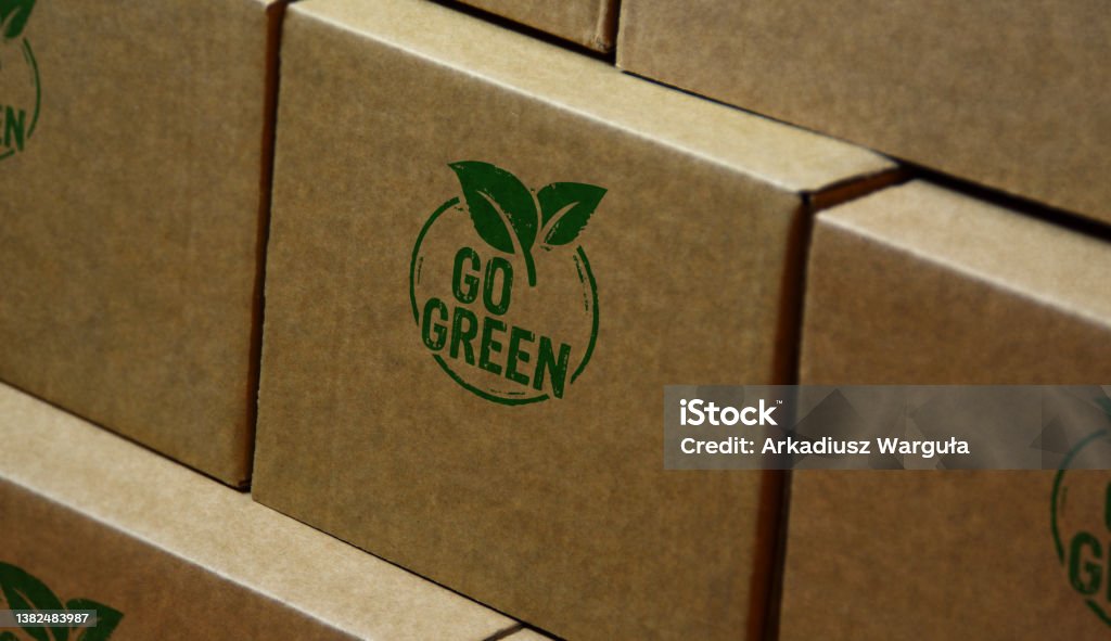 Go green and eco friendly symbol stamp and stamping Go green and eco friendly symbol stamp printed on cardboard box. Co2 neutral, ecology, environment, nature and climate concept. Sustainable Resources Stock Photo Go green and eco friendly symbol stamp and stamping Go green and eco friendly symbol stamp printed on cardboard box. Co2 neutral, ecology, environment, nature and climate concept. Sustainable Resources Stock Photo