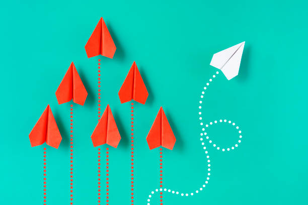 istock Individuality Concept with Paper Airplanes 1382489574