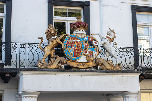 Coat of arms on a wall of the cathedral of Baeza, Andalusia