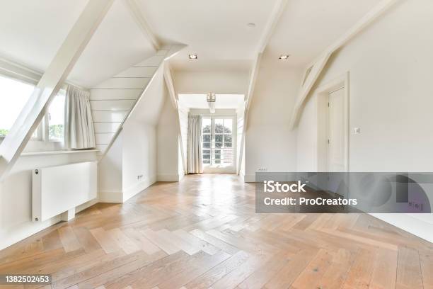 Empty Room In The Attic Of The House Stock Photo - Download Image Now - Attic, Design, Apartment