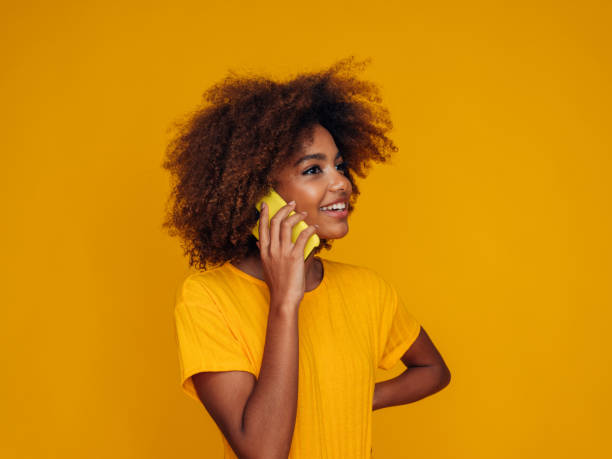 istock Woman holding a smart phone 1382505845