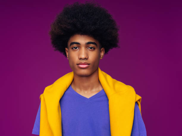 istock Portrait of emotional afro guy 1382510255