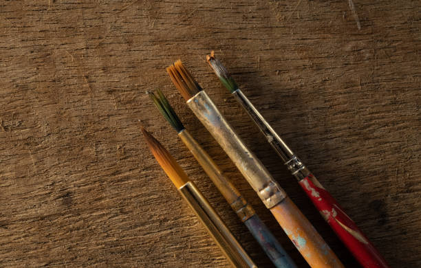 istock Close Up Of Four Artists Paintbrushes 1382513350