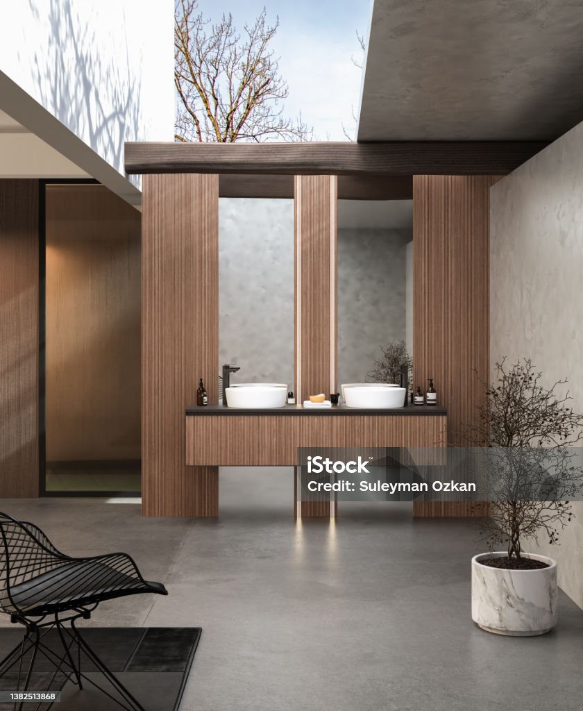 Cozy bathroom interior with concrete flooring, wood plaque and wooden furniture front view. Cozy bathroom interior with concrete flooring, wood plaque and wooden furniture front view. Minimalist cozy bathroom with modern furniture.Sun shine into room. 3d rendering Bathroom Stock Photo