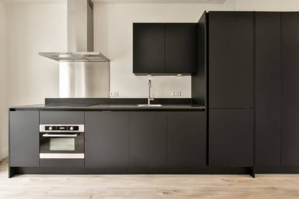 istock Corner kitchen of dark shade 1382536123