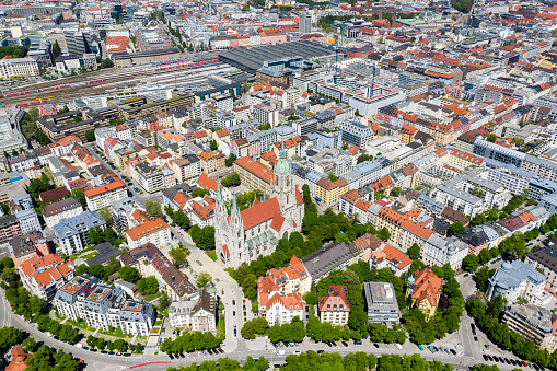 Aerial view of a downtown district with apartment houses and a church, central railway station, Munich, Bavaria, Germany.