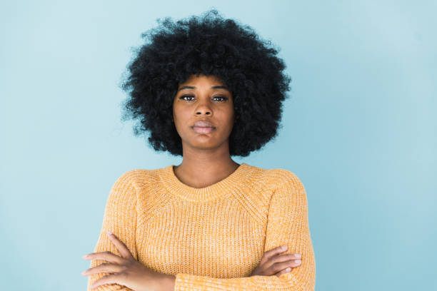 istock Portrait serious, determined young woman 1382551361
