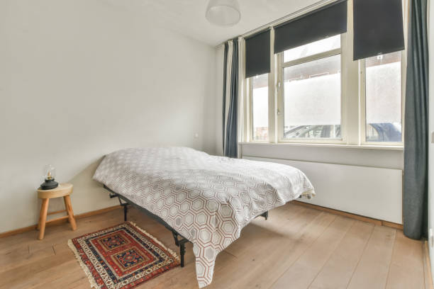 istock Loft bedroom with wooden floor 1382567597