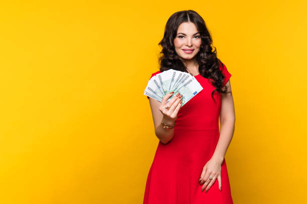 istock Woman showing fan euro 1382568651