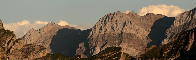 rocky mountain peaks in sunset light