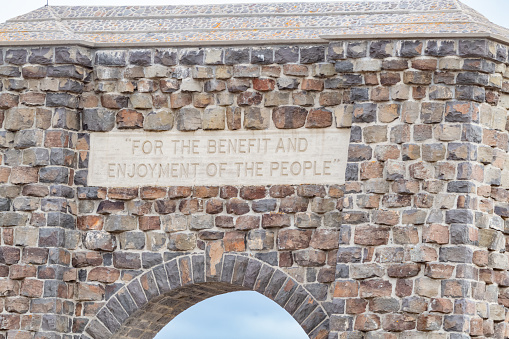 Welcoming sign at north and first entry to Yellowstone National Park on its 150 year anniversary. In Montana next to the town of Gardiner, Montana in the northwest part of United States of America (USA). John Morrison Photographer
