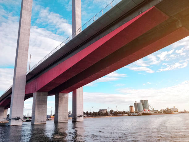 Bolte Bridge from the water Bolte Bridge construct, Melbourne, Victoria viewed from the harbour water. port melbourne melbourne stock pictures, royalty-free photos & images