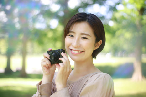 istock Woman taking a picture 1382595954