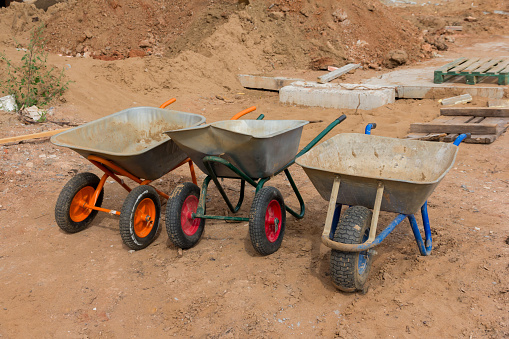 Multiple Wheelbarrows Construction Wheelbarrows Three Wheelbarrows Without People On The ...