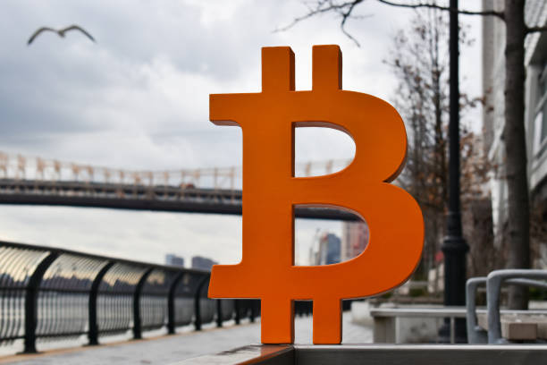 istock Bitcoin Enjoying A Scenic Walk By A Bridge In Manhattan 1382627678